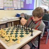 Chess team player in a game