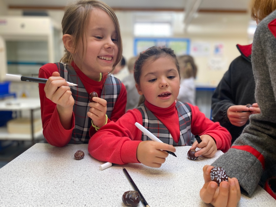 pupils turning conkers into hedgehogs