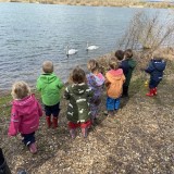children from nursery Looking for ducks