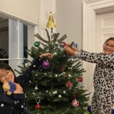 Decorating Main House Christmas Tree with boarding pupils