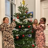 Boarders decorating the tree.