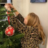 Boarders decorating the tree.