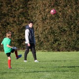 Inter-patrol football with Juniors
