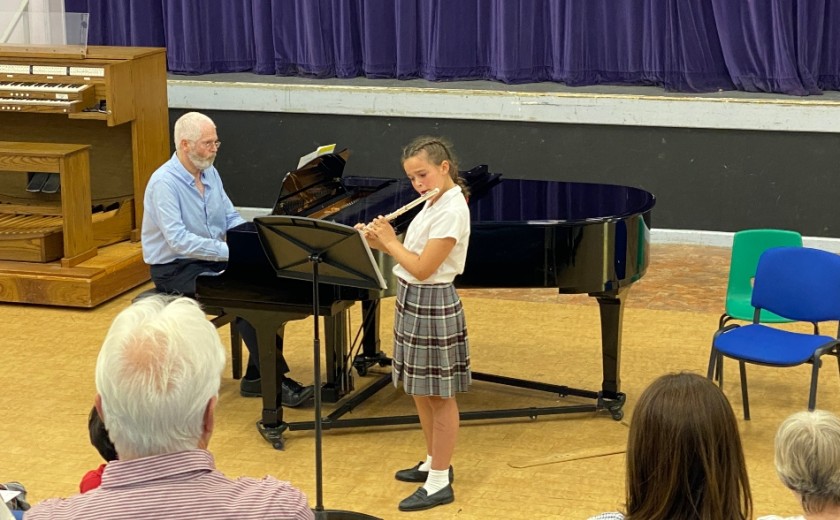 Individual performer playing flute