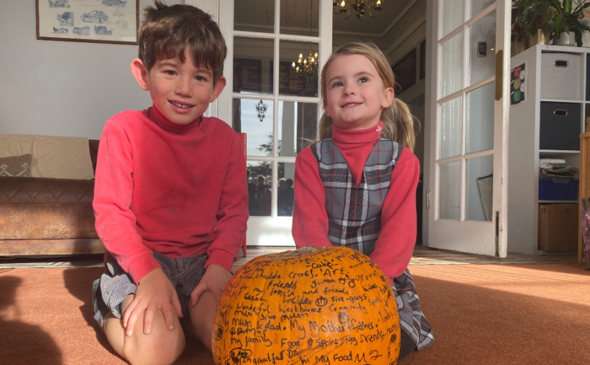 pupils with a pumpkin
