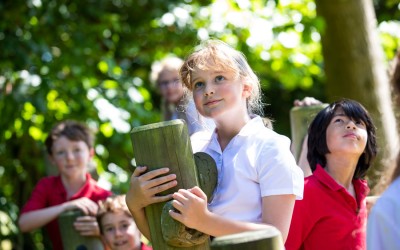 pupils climbing on frame